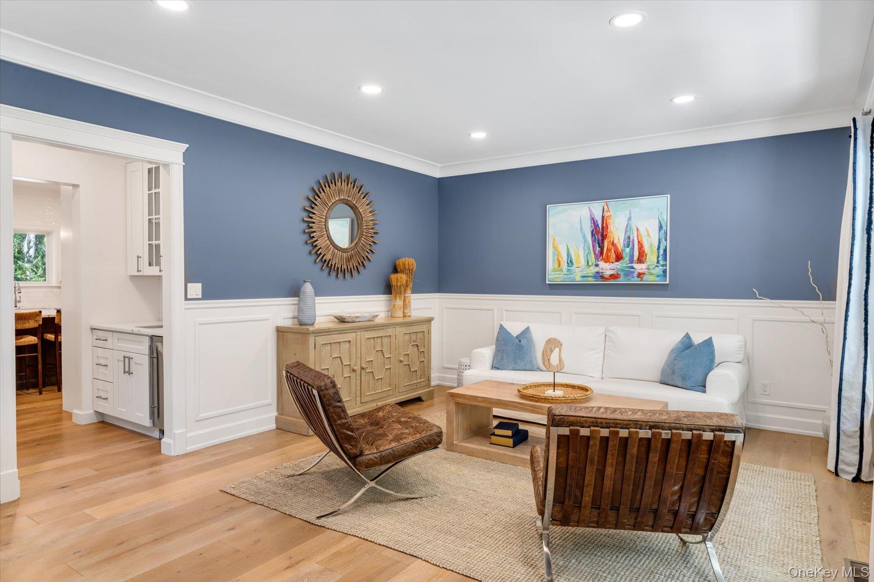 45 Old Sag Harbor Road Southampton, NY 11968 - Photo 23 of 47 a living room with furniture and a wooden floor