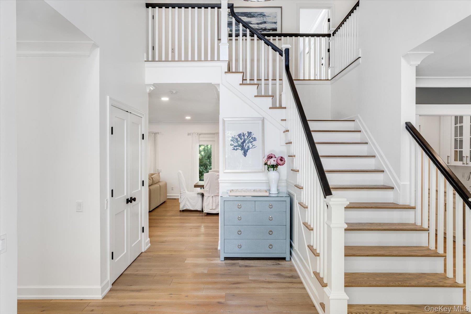 45 Old Sag Harbor Road Southampton, NY 11968 - Photo 26 of 47 a view of entryway with furniture and wooden floor