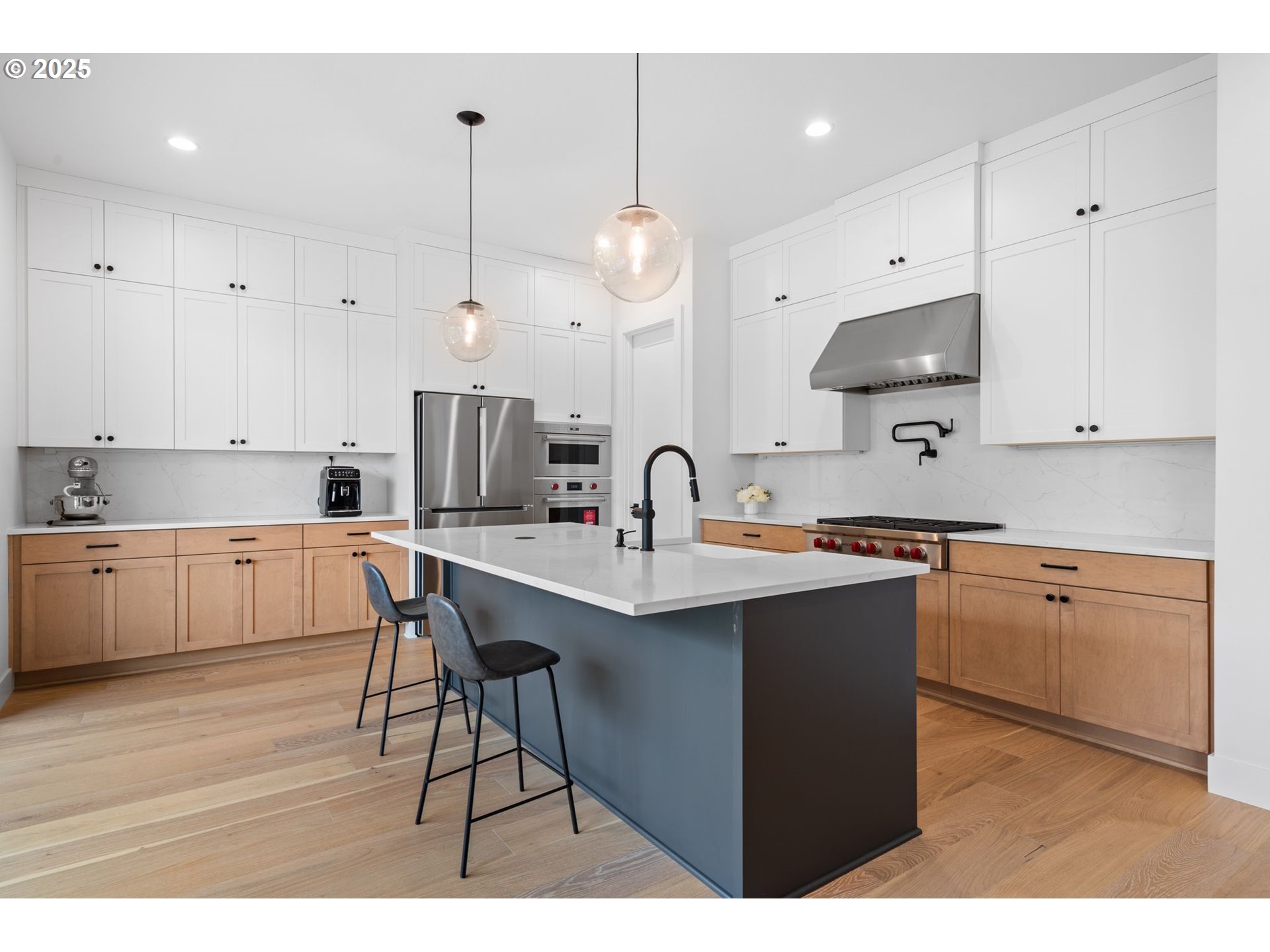 15625 Northwest Gooderham Street Portland, OR 97229 - Photo 15 of 45 a kitchen with granite countertop a sink cabinets and wooden floor