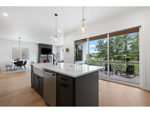 a kitchen with a sink and a stove