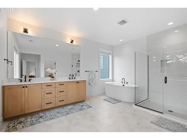 a bathroom with a sink a vanity and a mirror