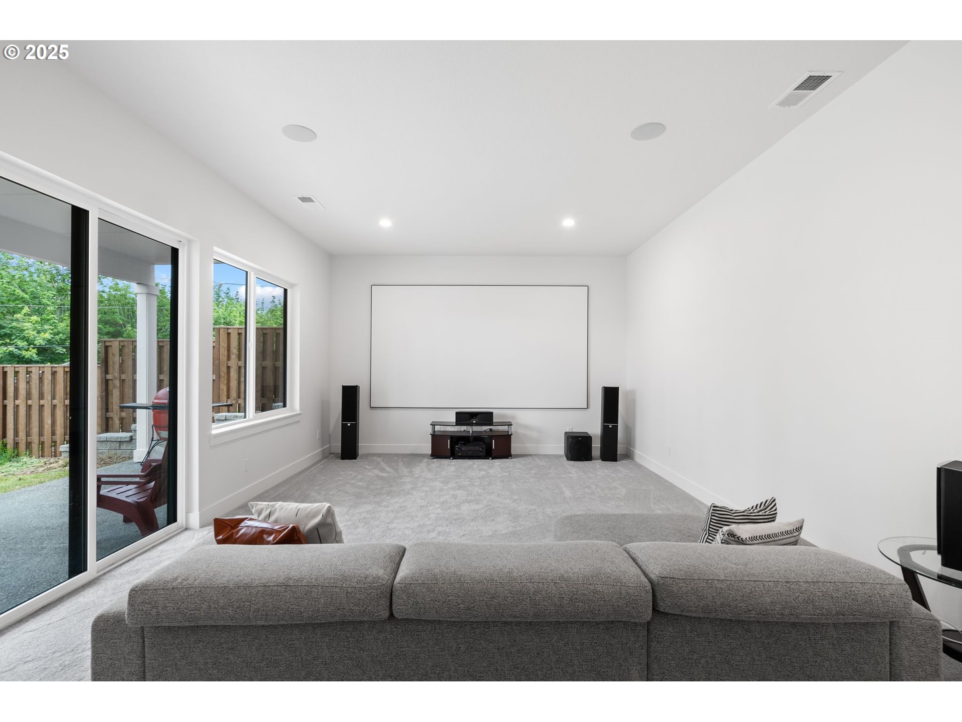 15625 Northwest Gooderham Street Portland, OR 97229 - Photo 36 of 45 a living room with furniture and large window