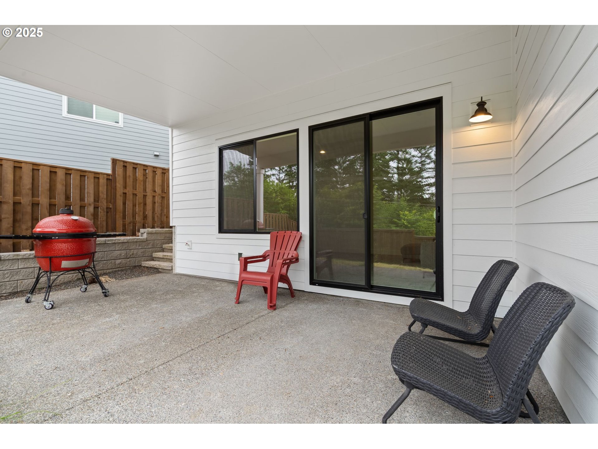 15625 Northwest Gooderham Street Portland, OR 97229 - Photo 40 of 45 a living room with furniture and a large window