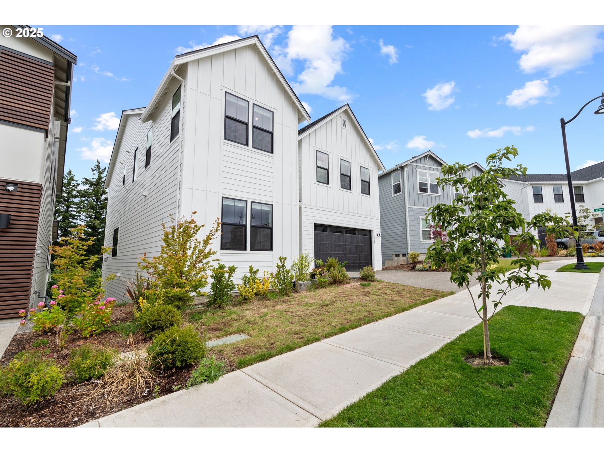 15625 Northwest Gooderham Street Portland, OR 97229 - Photo 45 of 45 a view of house with garden