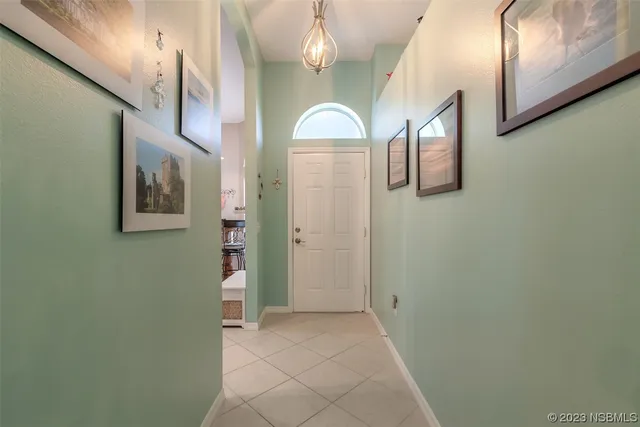 a view of a hallway with entryway