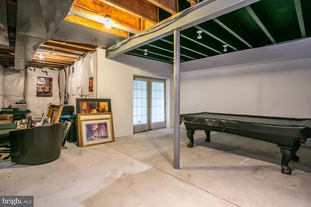a view of a chairs and table in the patio