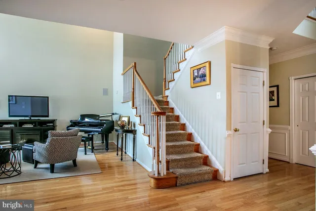 a view of a livingroom with furniture and wooden floor