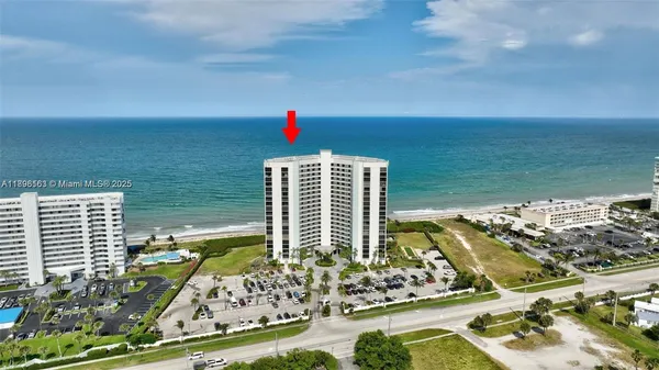 a view of building with ocean view