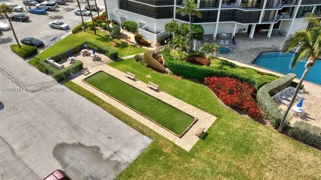 a view of a building with potted plants