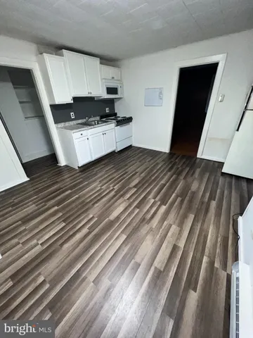 a view of a kitchen from the ceiling