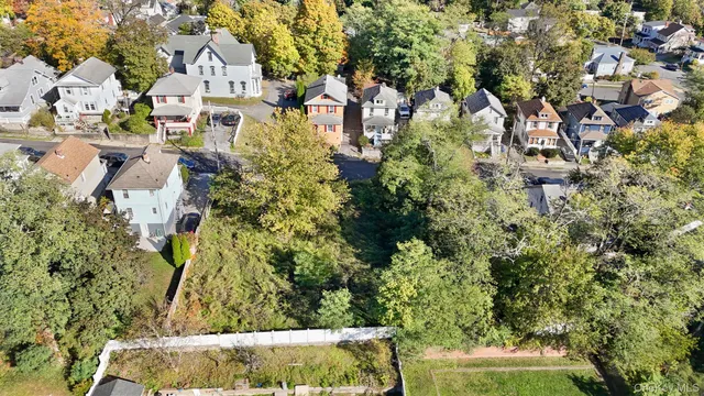 an aerial view of residential building with outdoor space