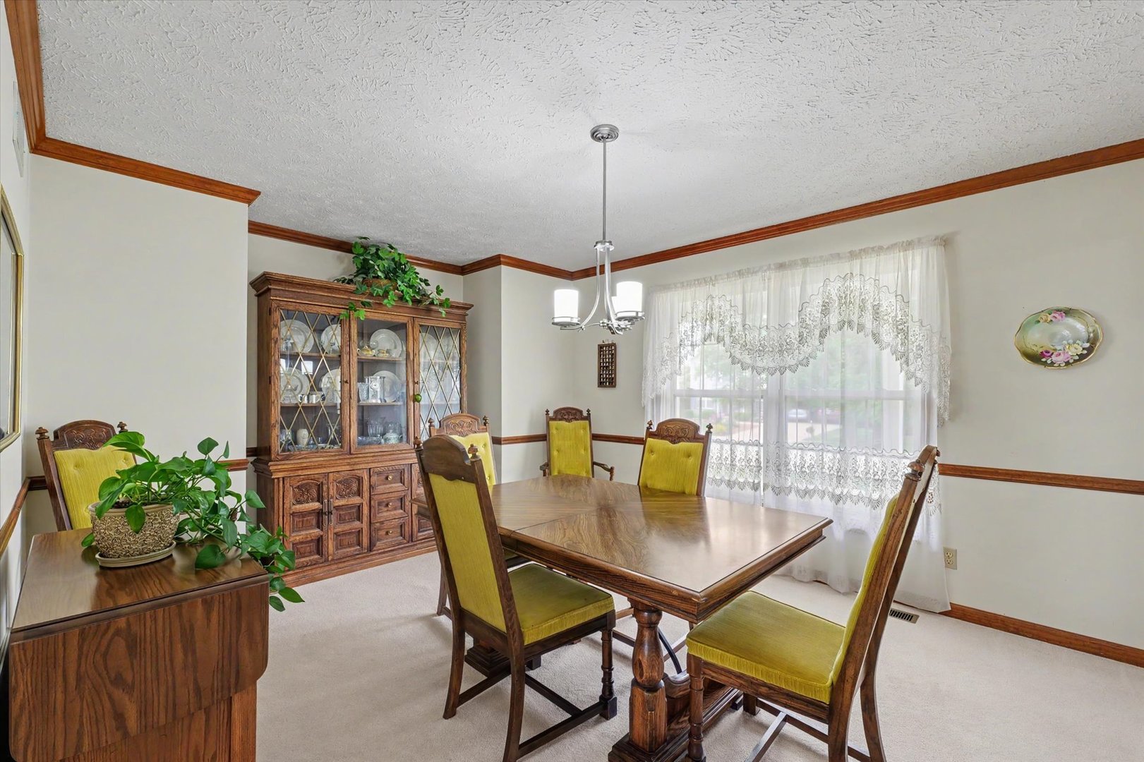 4409 Copper Ridge Road Champaign, IL 61822 - Photo 19 of 40 a view of a dining room with furniture and window