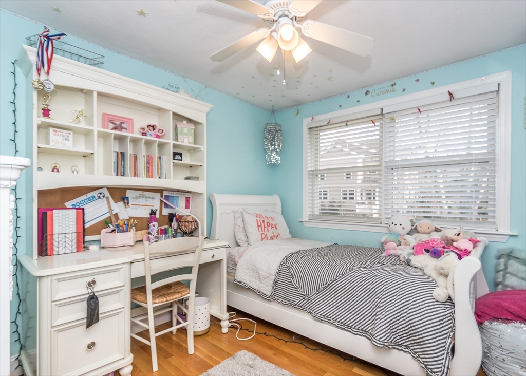 27 Sherman Street Needham, MA 02494 - Photo 15 of 32 a bedroom with a bed cabinets and window