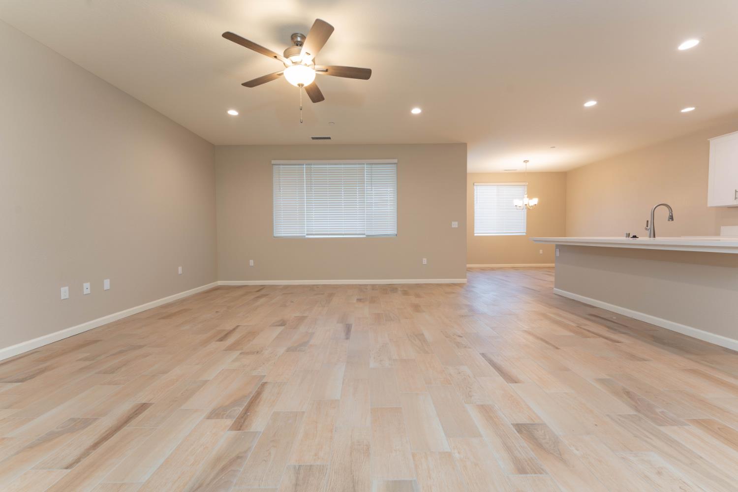 30480 Bellwood Road Visalia, CA 93291 - Photo 4 of 37 an empty room with a window and a ceiling fan