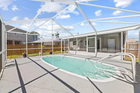 a house view with a sitting space and glass windows