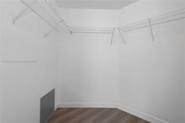 a view of an empty walk in closet