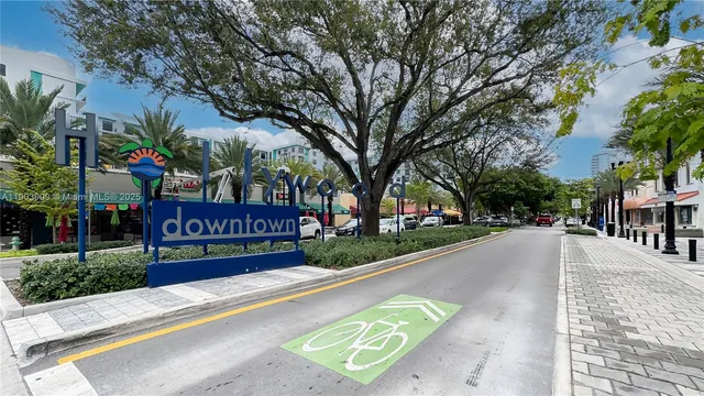 a sign on the side of a street