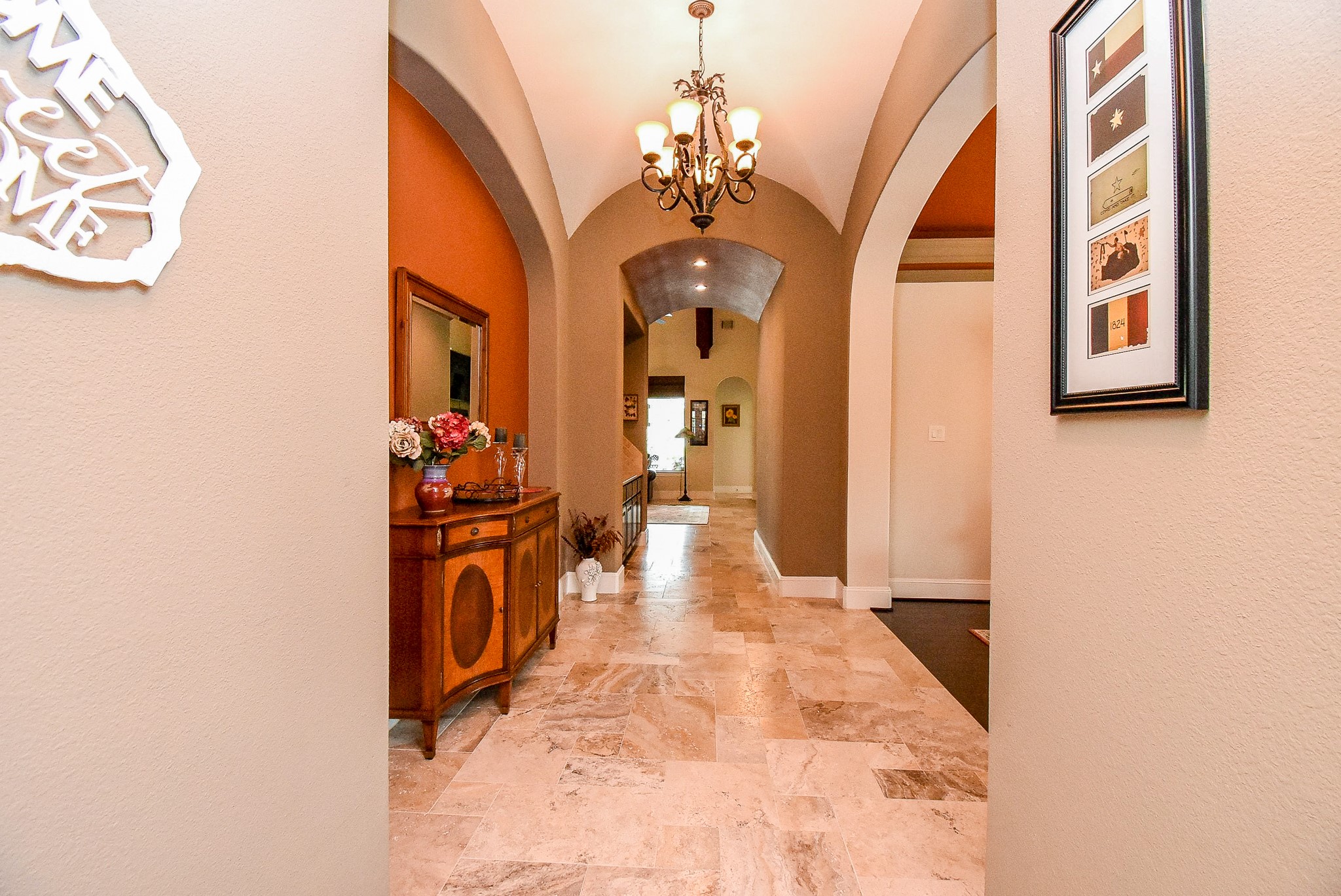 27427 Guthrie Ridge Lane Katy, TX 77494 - Photo 10 of 48 a hallway with a large mirror and a sink