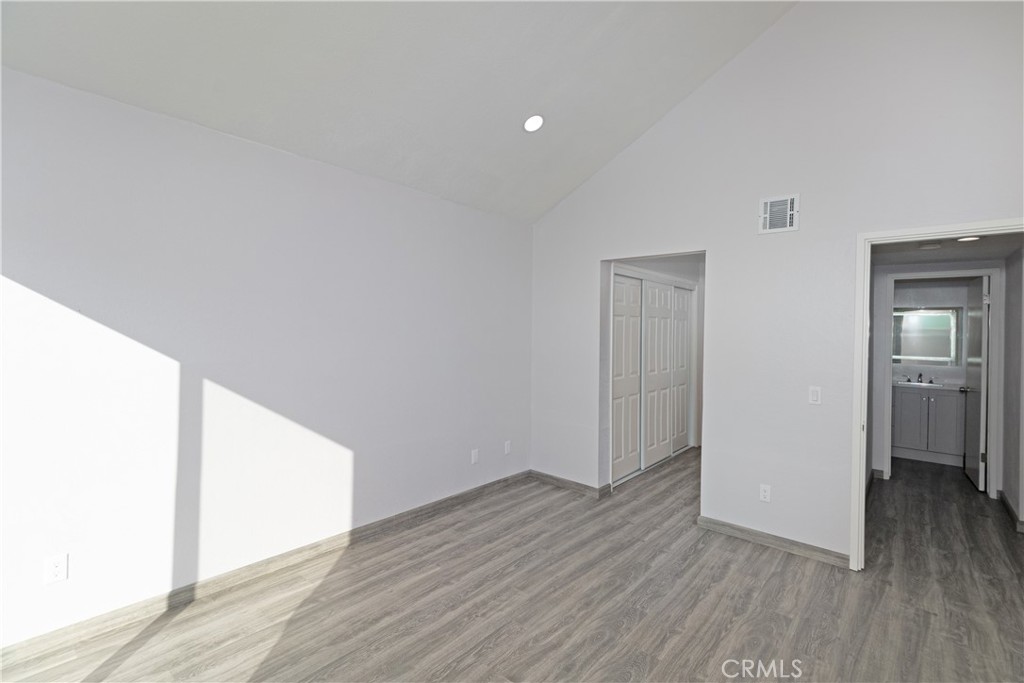435 West 9th, Unit F5 Upland, CA 91786 - Photo 7 of 23 a view of hallway with wooden floor