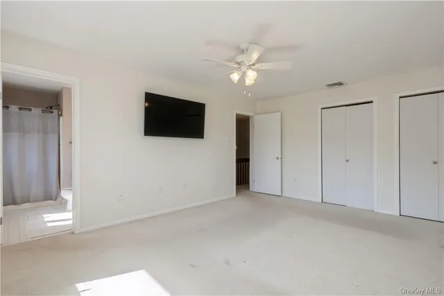 a view of a livingroom with a flat screen tv