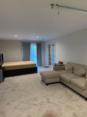 a living room with furniture and a couch