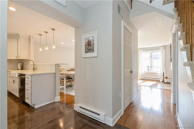 a view of a kitchen from the hallway