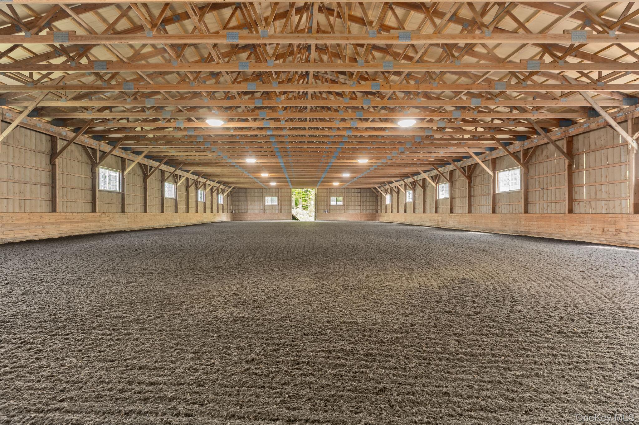5 Mc Carthy Road Holmes, NY 12531 - Photo 7 of 50 72x160 indoor riding ring connected to the barn with new footing, a new roof and new LED lighting