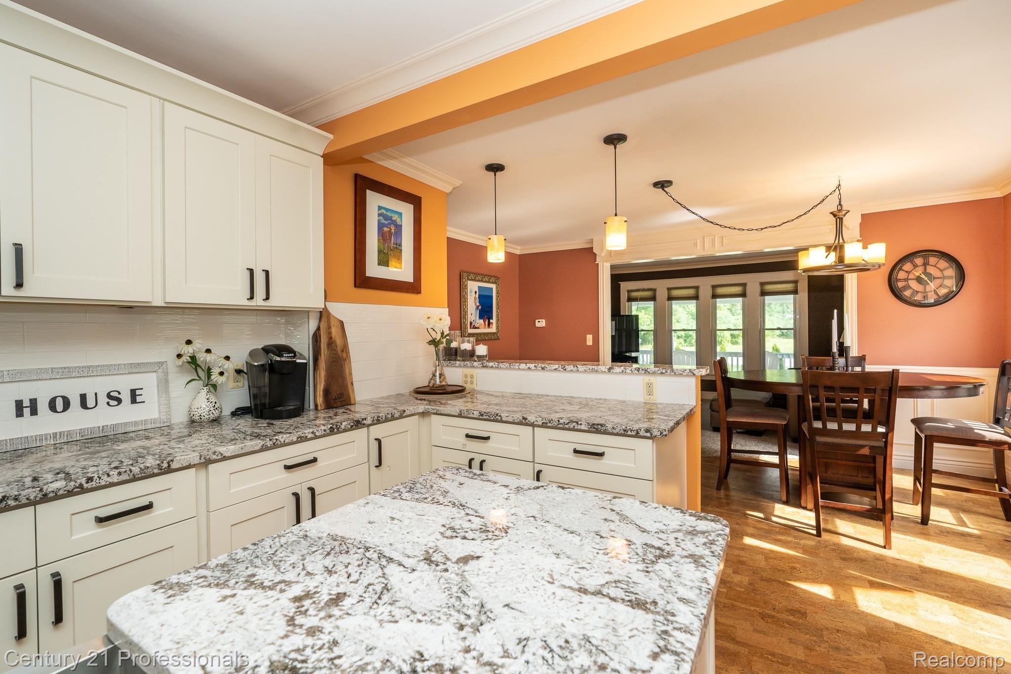 2341 West Auburn Road Rochester, MI 48309 - Photo 8 of 57 Nice Open Kitchen with Cork Flooring leading into Dining Area