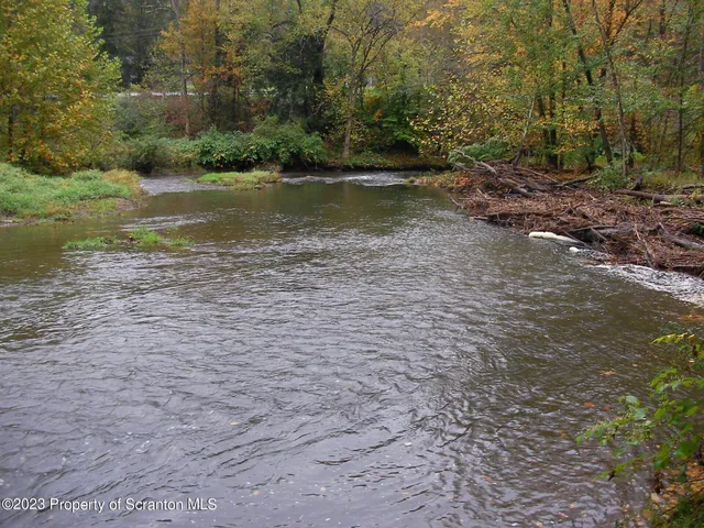 a view of a road with an outdoor space