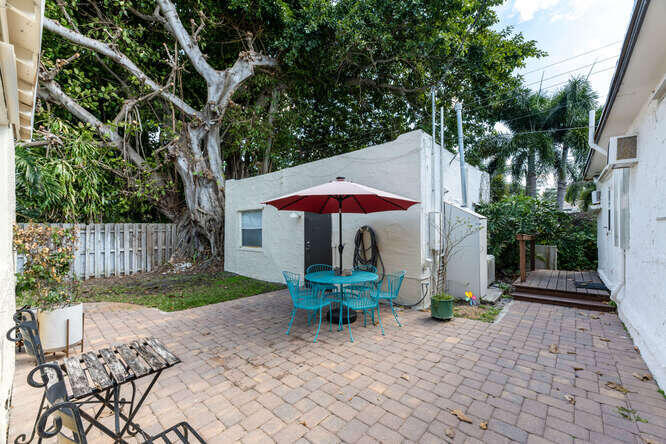 830 Valley Forge Road West Palm Beach, FL 33405 - Photo 18 of 23 view of patio, cottage, and guest suite