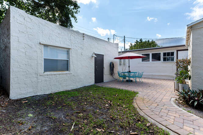 830 Valley Forge Road West Palm Beach, FL 33405 - Photo 19 of 23 view of cottage and patio