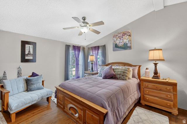 269 Mindella Way, Unit A Layton, UT 84041 - Photo 15 of 37 Bedroom featuring a ceiling fan and wood finished floors