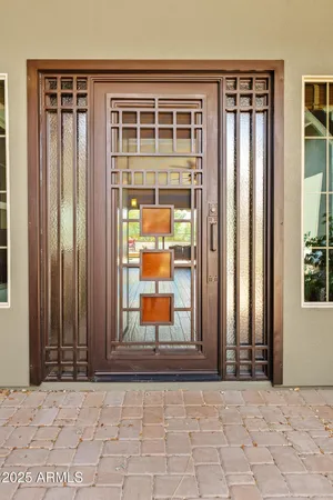 an entrance view of a house with an outdoor space