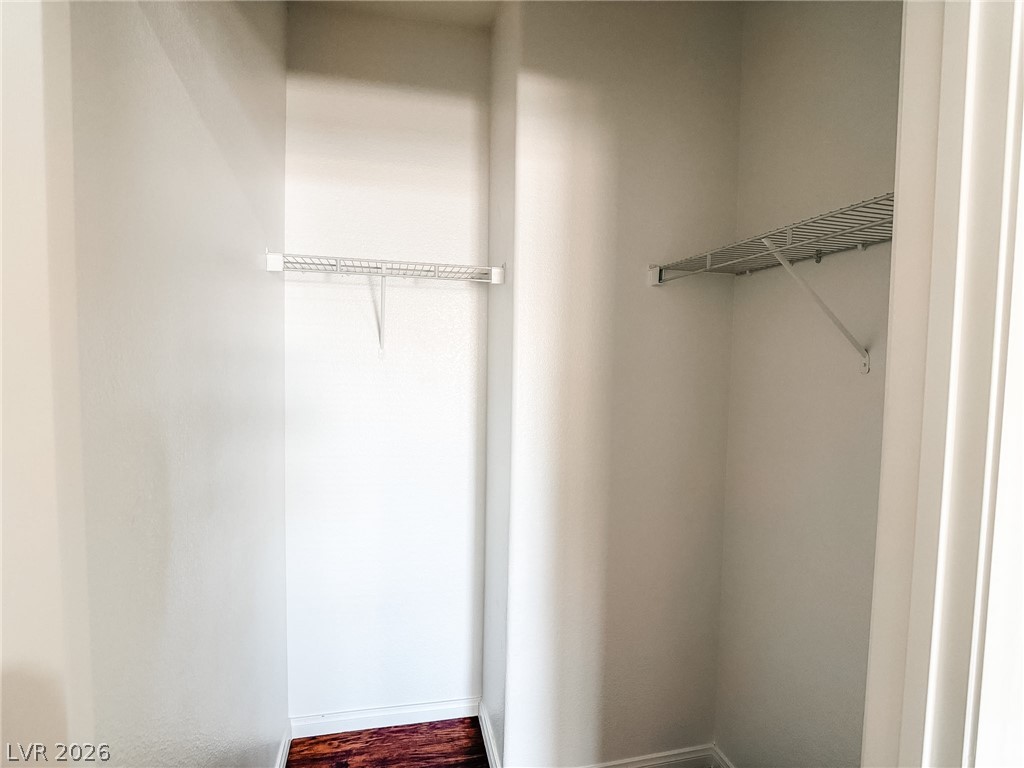 7701 West Robindale Road, Unit 110 Las Vegas, NV 89113 - Photo 13 of 21 Ample storage solutions abound in this well-appointed closet, featuring durable wire shelving.
