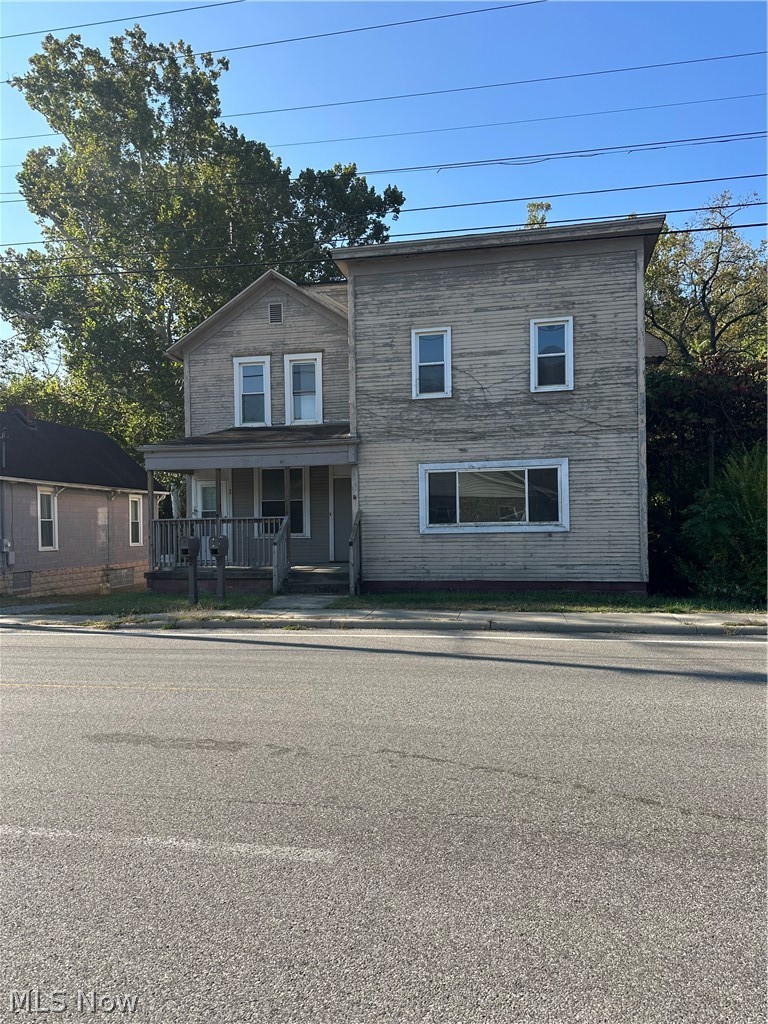 View of front of home with covered porch