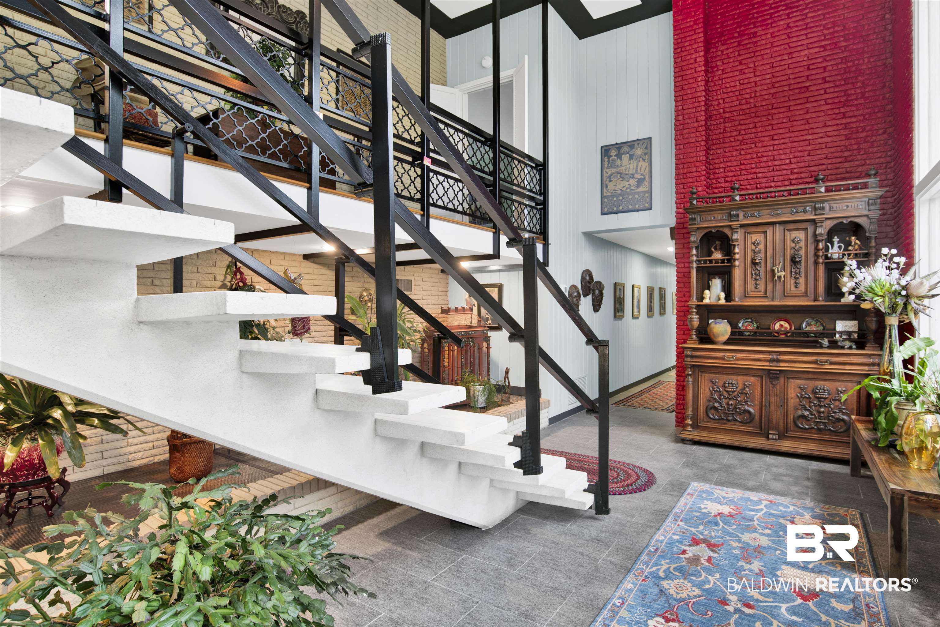 809 Bernard Circle Mobile, AL 36693 - Photo 16 of 75 Modern open-riser staircase with contrasting black metal railings