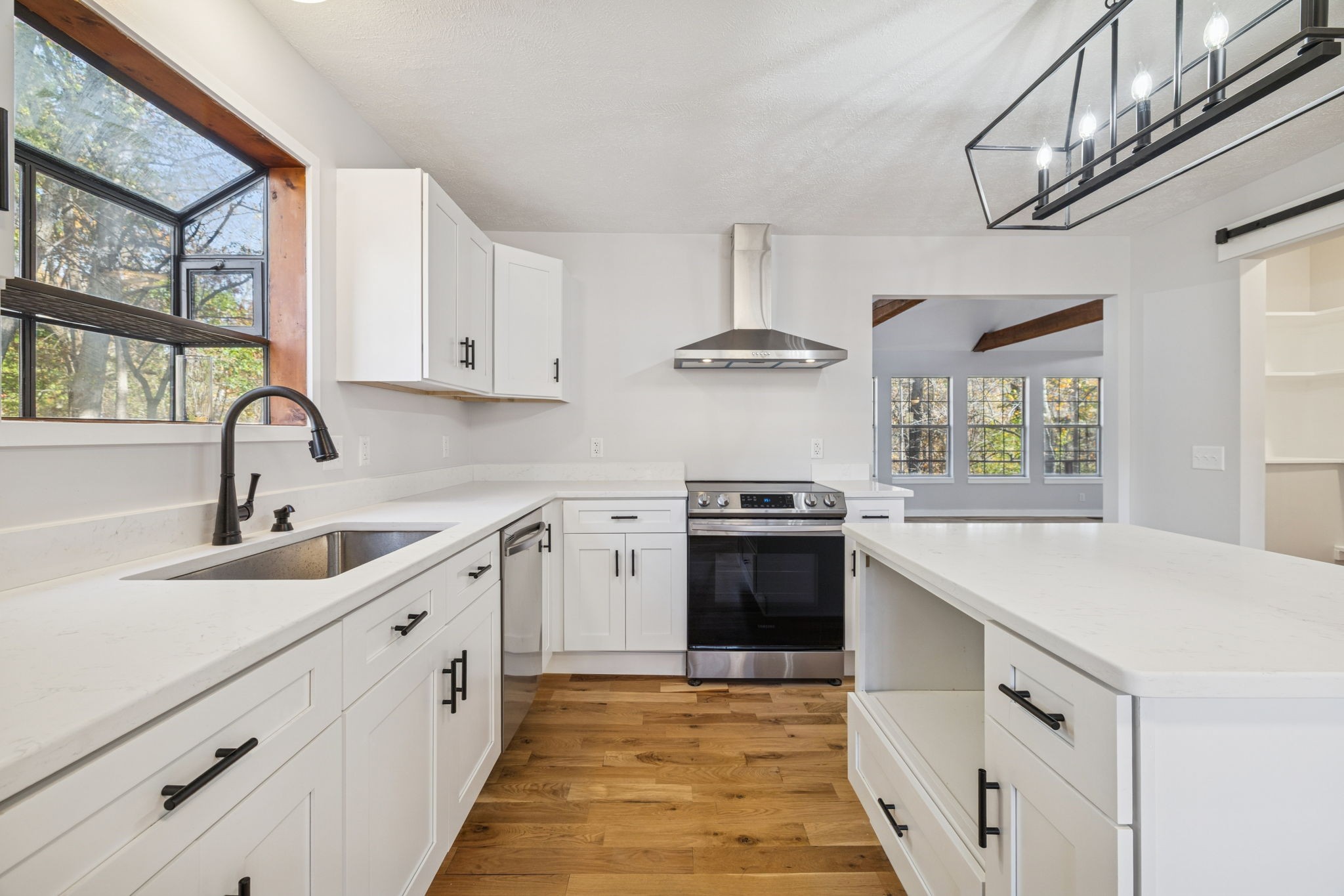 4222 Gourley Road Pegram, TN 37143 - Photo 15 of 76 a kitchen with stainless steel appliances a sink stove and cabinets