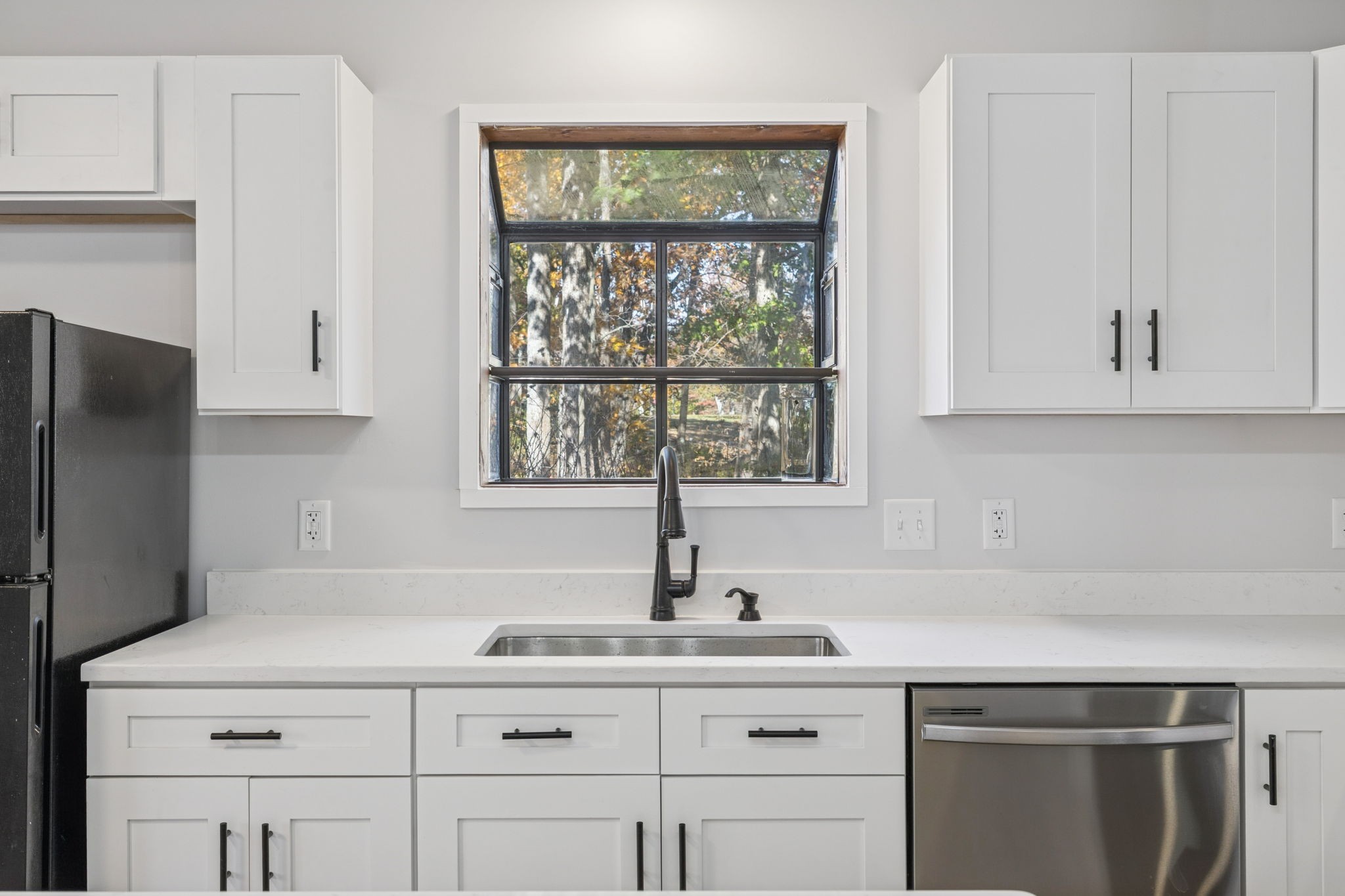 4222 Gourley Road Pegram, TN 37143 - Photo 16 of 76 a kitchen with appliances cabinets and a window