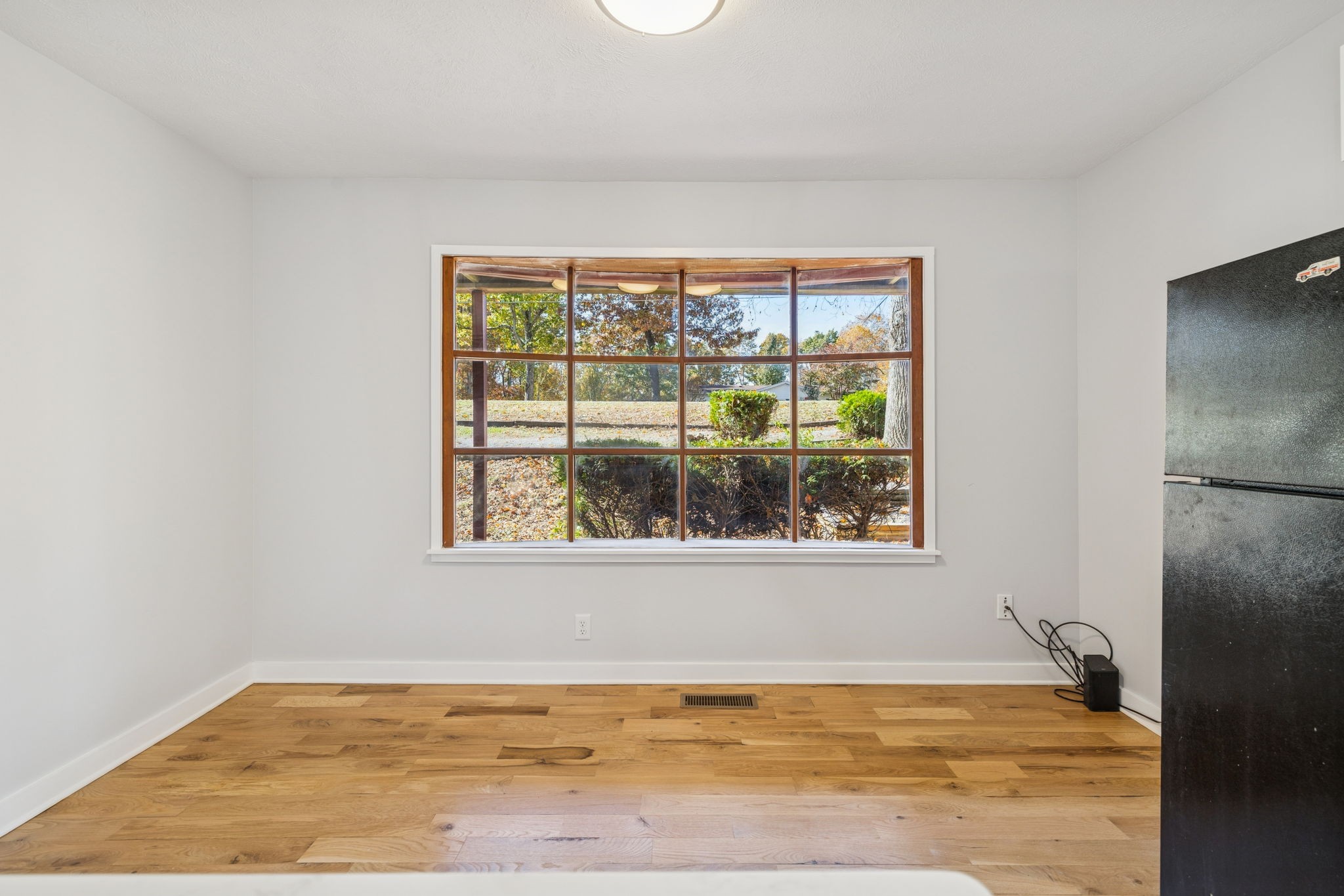 4222 Gourley Road Pegram, TN 37143 - Photo 26 of 76 a view of a room with wooden floor and a window