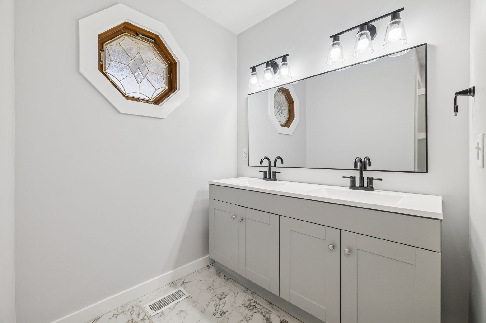 4222 Gourley Road Pegram, TN 37143 - Photo 34 of 76 a bathroom with a sink and a mirror