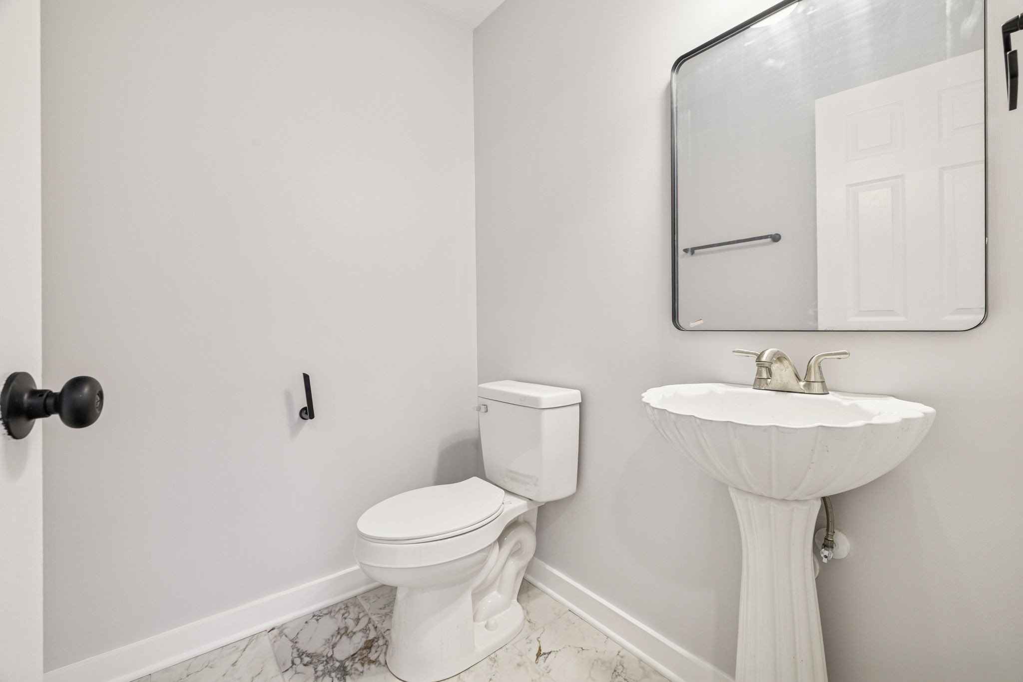 4222 Gourley Road Pegram, TN 37143 - Photo 42 of 76 a bathroom with a sink toilet and a mirror