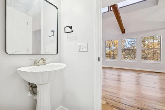 a bathroom with a bathtub and shower
