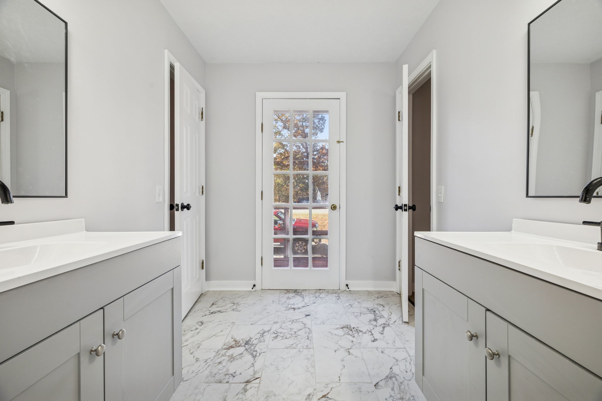 4222 Gourley Road Pegram, TN 37143 - Photo 58 of 76 a bathroom with a sink and a mirror