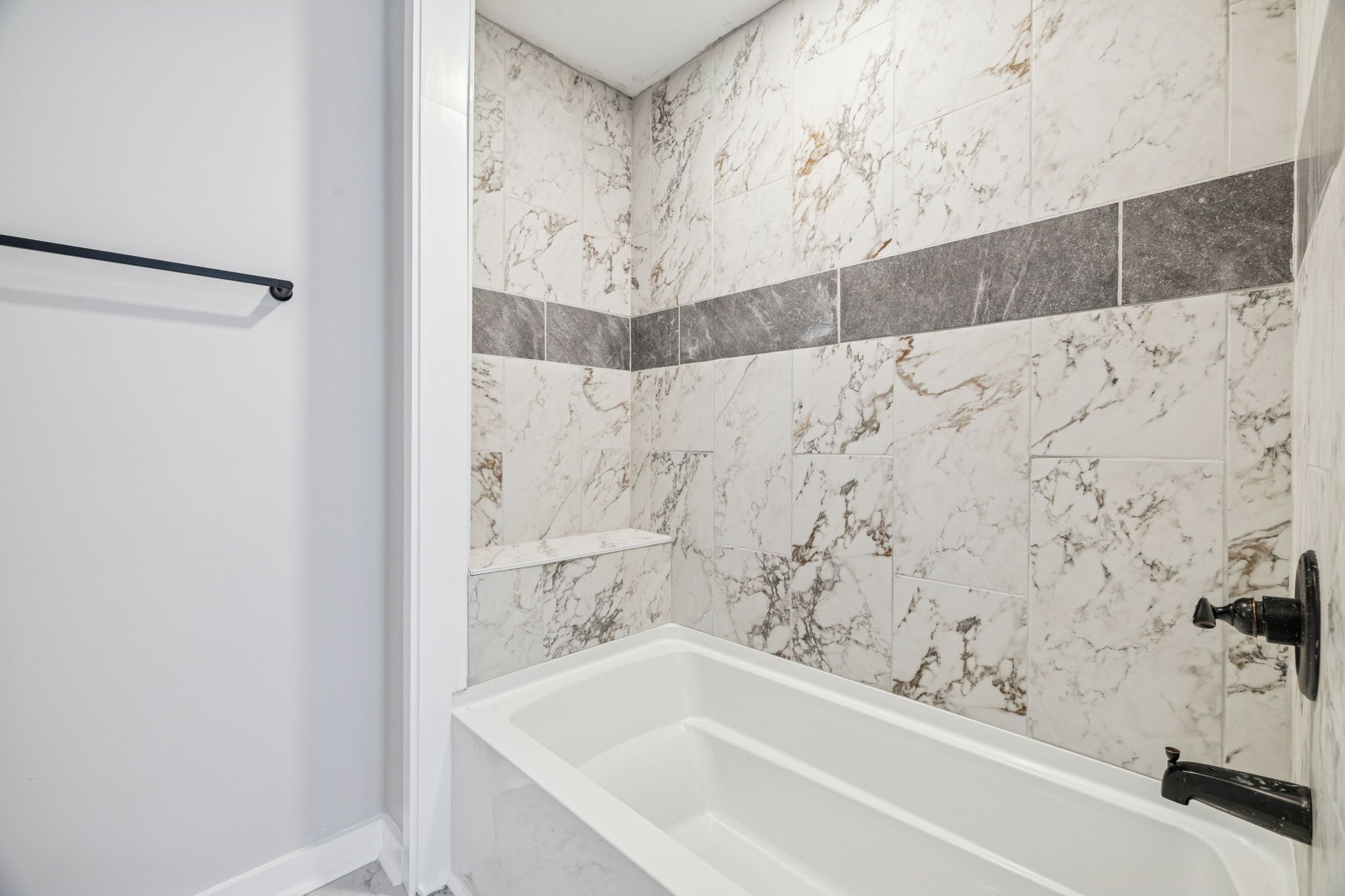 4222 Gourley Road Pegram, TN 37143 - Photo 60 of 76 a bathroom with a bathtub and shower