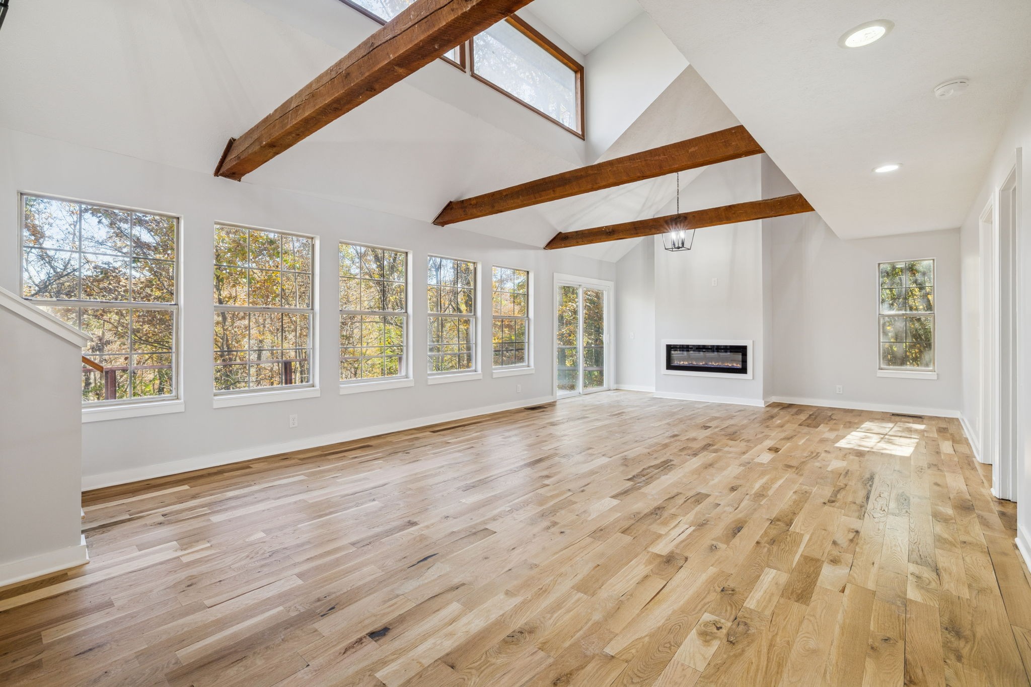 4222 Gourley Road Pegram, TN 37143 - Photo 6 of 76 a view of empty room with wooden floor and fan