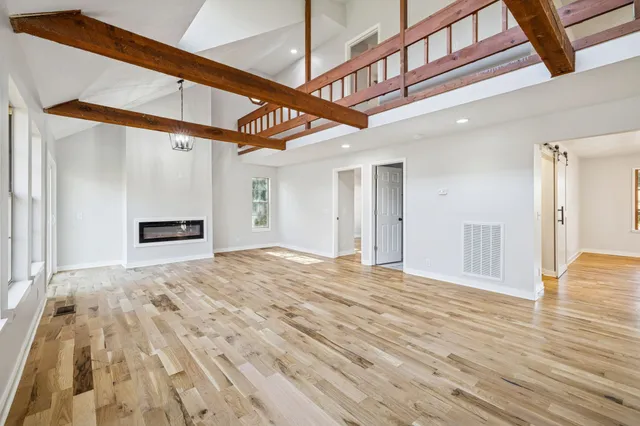a kitchen with stainless steel appliances a sink and a stove