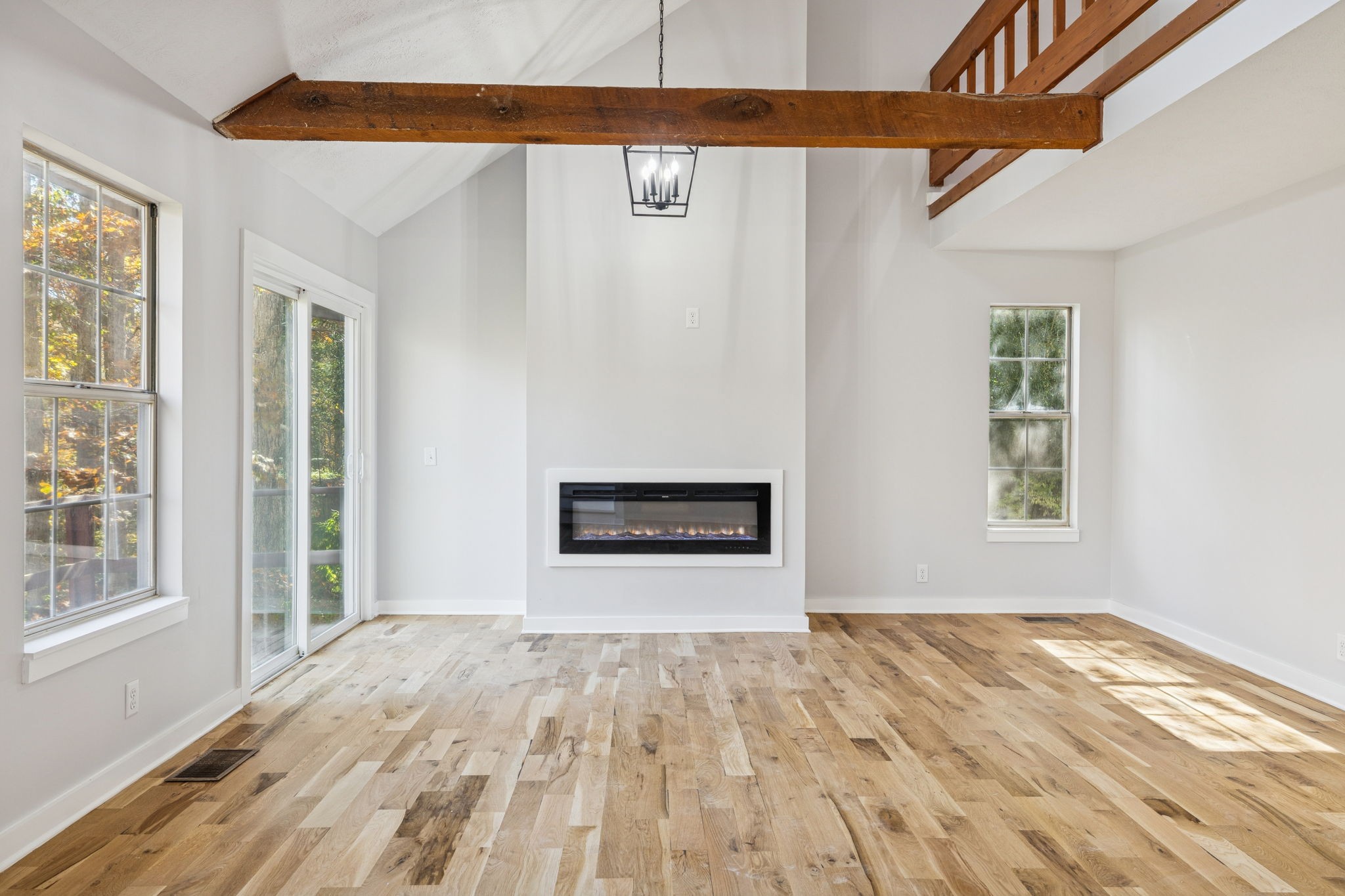 4222 Gourley Road Pegram, TN 37143 - Photo 9 of 76 a view of empty room with wooden floor and fan