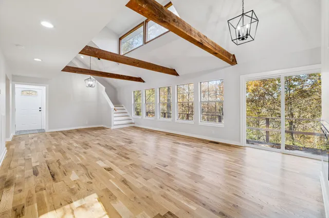 a kitchen with appliances cabinets and a window