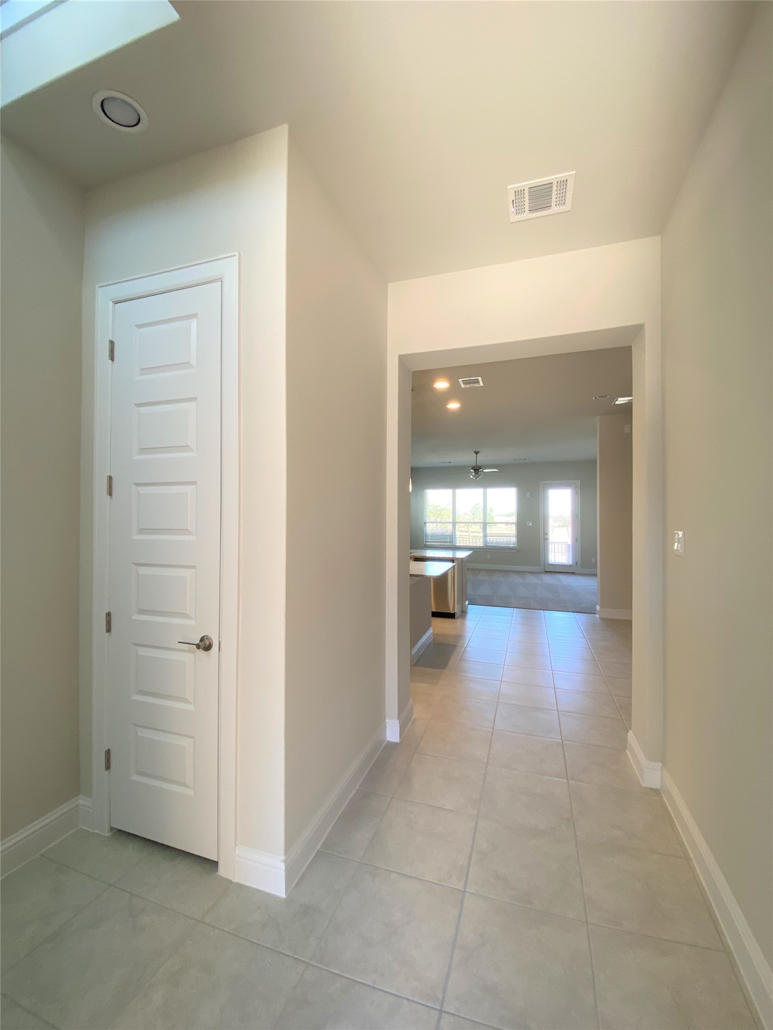 600 C-Bar Ranch Trail, Unit 105 Cedar Park, TX 78613 - Photo 2 of 12 Hallway with light tile patterned floors and recessed lighting