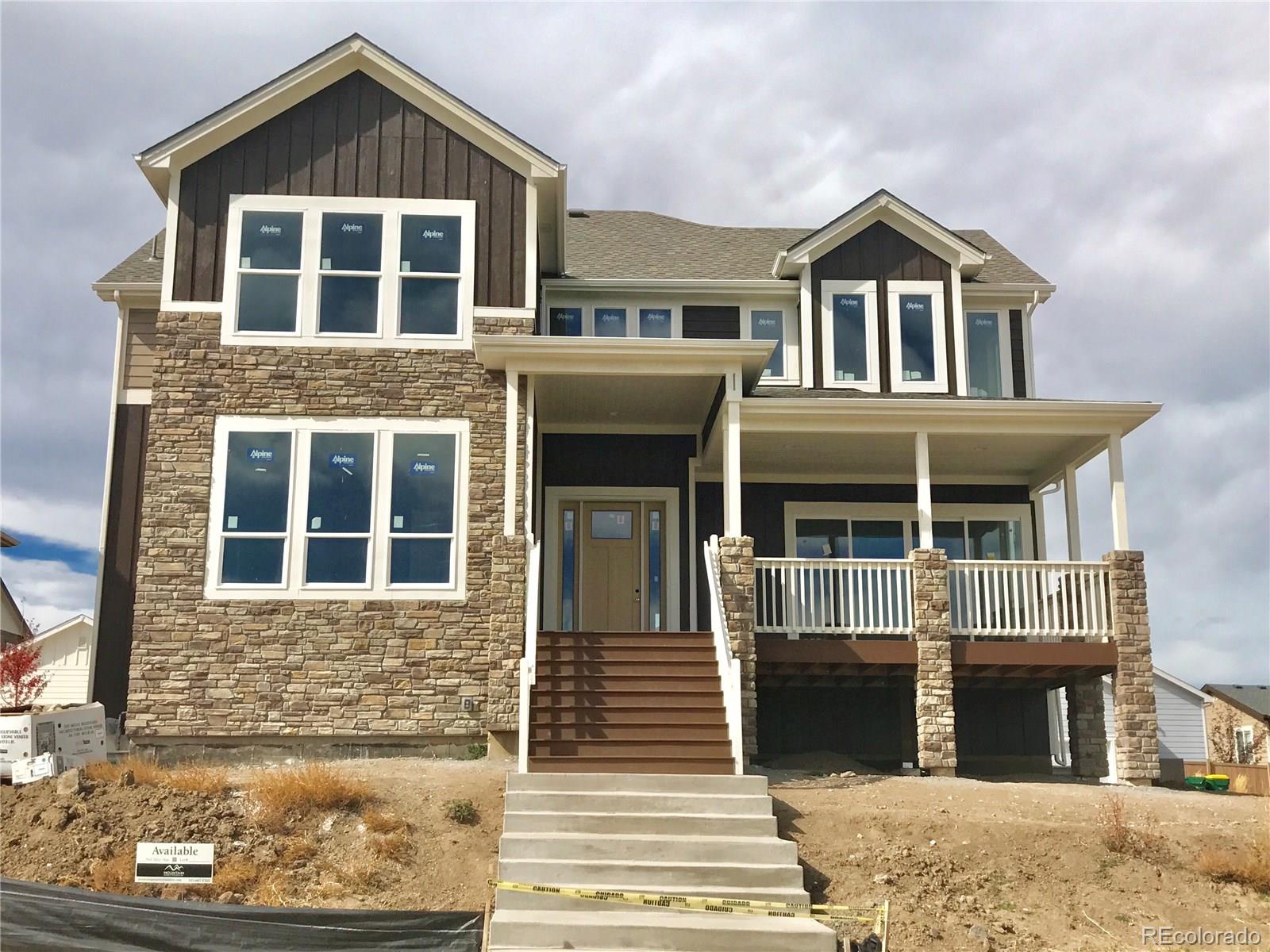 4378 Fell Mist Way Castle Rock, CO 80109 - Photo 7 of 18 a front view of a house with a yard